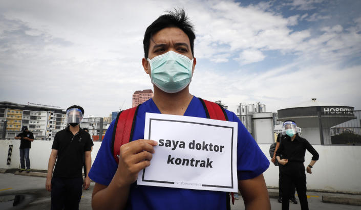 A male contract doctor protesting in Malaysia.