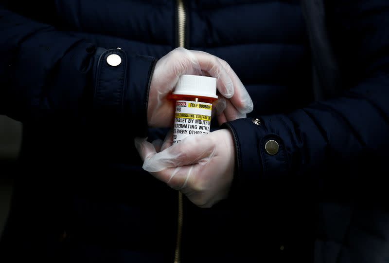 Laura Ng is pictured with her hydroxychloroquine prescription during the coronavirus disease (COVID-19) outbreak in Seattle