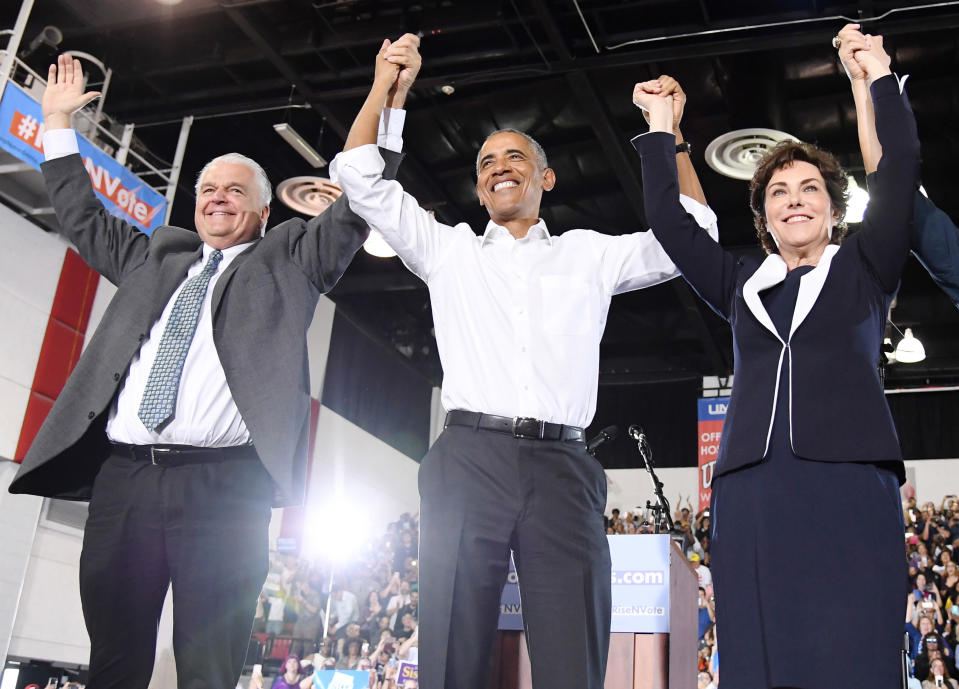 From left, Clark County Commission Chairman and Democratic gubernatorial candidate Steve Sisolak, former President Barack Obama, and U.S. Senate candidate Rep. Jacky Rosen at a get-out-the-vote rally at the Cox Pavilion as Obama campaigns for Nevada Democratic candidates on Oct. 22, 2018, in Las Vegas. (Photo: Ethan Miller/Getty Images)