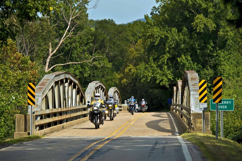 <p><strong>The Drive: </strong><a href="https://www.tripadvisor.com/Attraction_Review-g31834-d13966159-Reviews-Pig_Trail_National_Scenic_Byway-Ozark_Arkansas.html" rel="nofollow noopener" target="_blank" data-ylk="slk:Pig Trail Scenic Byway;elm:context_link;itc:0;sec:content-canvas" class="link ">Pig Trail Scenic Byway</a></p><p><strong>The Scene: </strong>Clocking in at 19 miles long, the Pig Trail Scenic Byway lies within the <a href="https://www.tripadvisor.com/Attraction_Review-g28925-d298748-Reviews-Boston_Mountains_Scenic_Loop-Arkansas.html" rel="nofollow noopener" target="_blank" data-ylk="slk:Boston Mountains;elm:context_link;itc:0;sec:content-canvas" class="link ">Boston Mountains</a> region of the <a href="https://www.tripadvisor.com/Attraction_Review-g28925-d109478-Reviews-Ozark_Mountains-Arkansas.html" rel="nofollow noopener" target="_blank" data-ylk="slk:Arkansas Ozark Mountains;elm:context_link;itc:0;sec:content-canvas" class="link ">Arkansas Ozark Mountains</a>. Some say the drive got its name because the winding road looks like the corkscrew tail of a pig. Crossing over the Mulberry River and through the Ozark Highlands Trail, this route showcases a riot of colorful foliage during the spring, summer, and fall. </p><p><strong>The Pit-Stop: </strong>Looking for your next camping trip? Stop at the <a href="https://www.tripadvisor.com/Hotel_Review-g31804-d1641659-Reviews-White_Rock_Mountain-Mulberry_Arkansas.html" rel="nofollow noopener" target="_blank" data-ylk="slk:White Rock Mountain Recreation Area;elm:context_link;itc:0;sec:content-canvas" class="link ">White Rock Mountain Recreation Area</a> and spend the day climbing the 2,260-foot peak to get a closer look of the surrounding views of the Ozarks. </p>