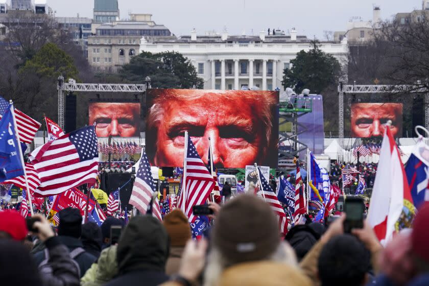 Trump supporters participate in a rally Wednesday, Jan. 6, 2021 in Washington. As Congress prepares to affirm President-elect Joe Biden's victory, thousands of people have gathered to show their support for President Donald Trump and his baseless claims of election fraud. The president is expected to address a rally on the Ellipse, just south of the White House. (AP Photo/John Minchillo)