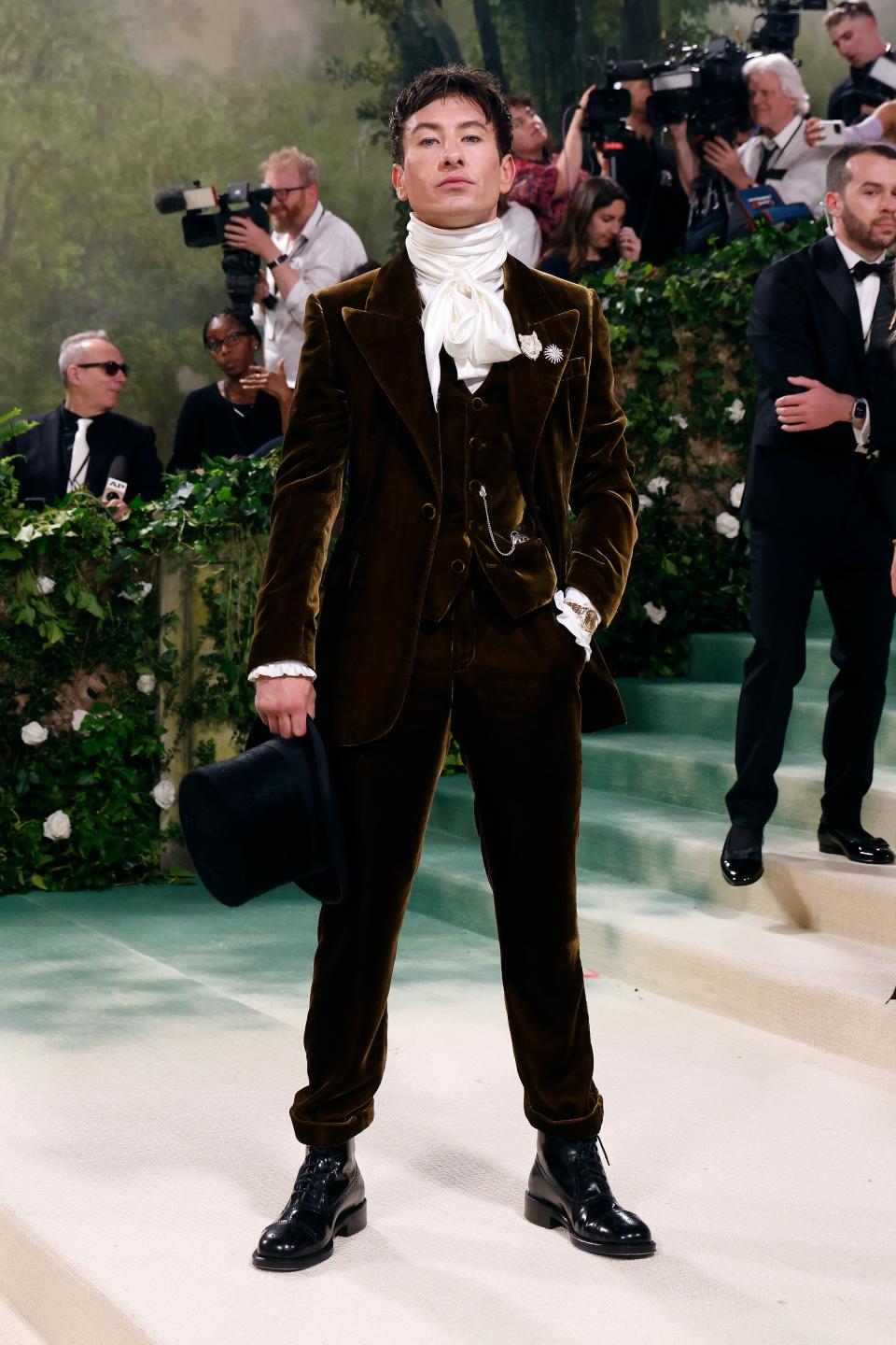 We love it when the guys have fun with their Met Gala looks — even if they ruffle some feathers. It might not be everyone's cup of tea, but Barry Keoghan nailed it with his velvet suit, cravat, and top hat, leaning all the way into the theme.