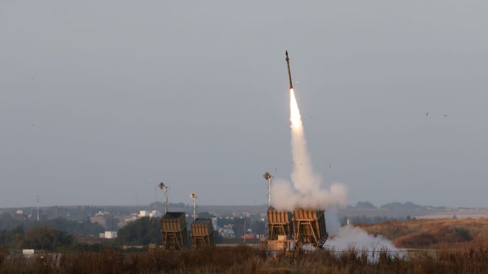 Israeli forces fire rockets from their Iron Dome defence system near the southern city of Sderot to intercept rockets launched from the Gaza Strip, on May 13, 2023. - Menahem Kahana/AFP/Getty Images
