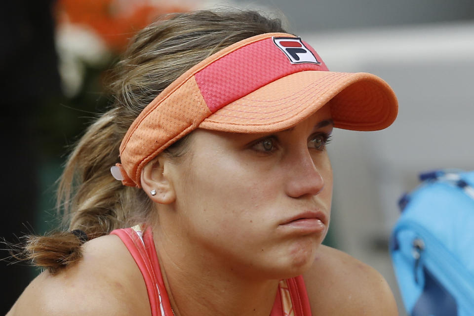 Sofia Kenin of the U.S. reacts to losing the final of the French Open tennis tournament against Poland's Iga Swiatek at the Roland Garros stadium in Paris, France, Saturday, Oct. 10, 2020. (AP Photo/Michel Euler)