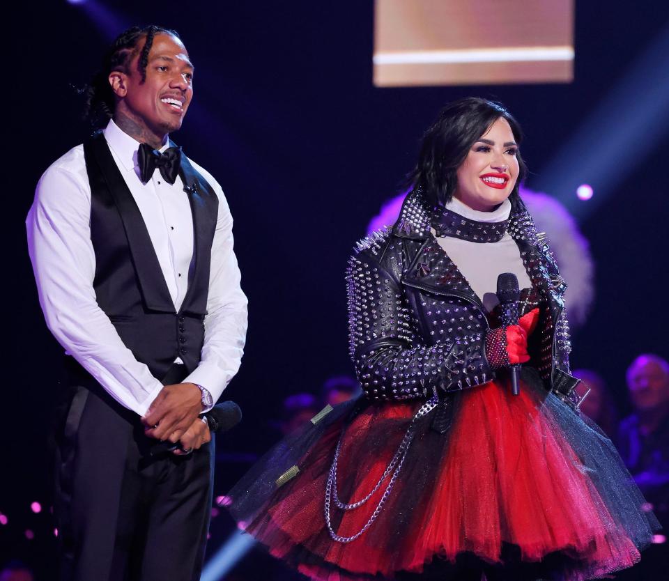 Nick Cannon and Demi Lovato in the all-new “Season 10 Kickoff” episode of "The Masked Singer".