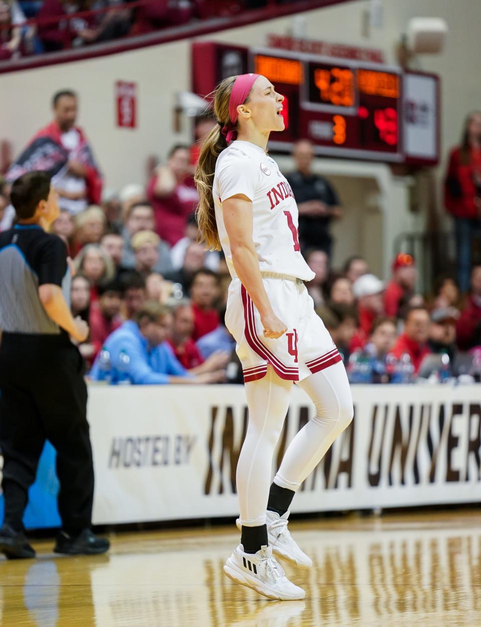 Indiana Hoosiers guard Sara Scalia (14) celebrates after making a three-pointer during the NCAA tournament first round game against the Fairfield Stags at Simon Skjodt Assembly Hall on Saturday, March 23, 2024.