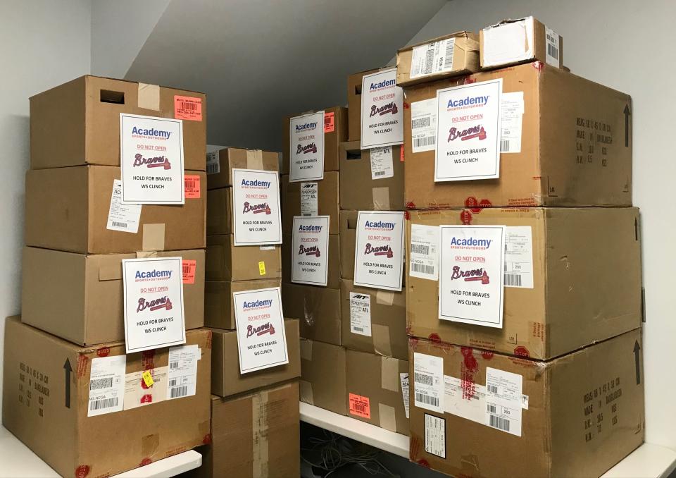 Academy Sports + Outdoors in Evans had boxes of Atlanta Braves championship gear in storage ready for when the Braves won the World Series. The store opened right after the game.