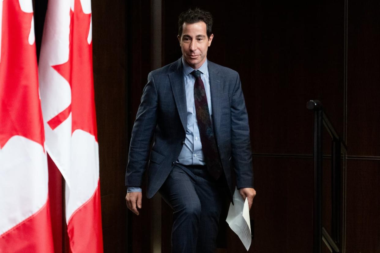 Liberal MP Anthony Housefather makes his way to the podium ahead of a media conference in Ottawa, on May 8. On Tuesday, Housefather spoke out against an antisemitic poster that called him a neo-Nazi and said he should 'get out of Canada.' (Spencer Colby/The Canadian Press - image credit)