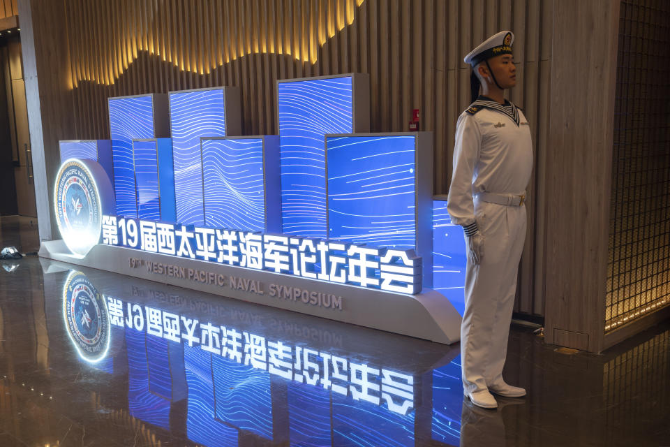 A Chinese sailor stands on duty outside the venue for the Western Pacific Navy Symposium held in Qingdao in eastern China's Shandong province on Monday, April 22, 2024. Zhang Youxia, Vice Chairman of the CPC Central Military Commission, China's second-ranking military leader under Xi Jinping, said China committed to solve maritime disputes through dialogue but warned that International law could not be distorted.(AP Photo/Ng Han Guan)