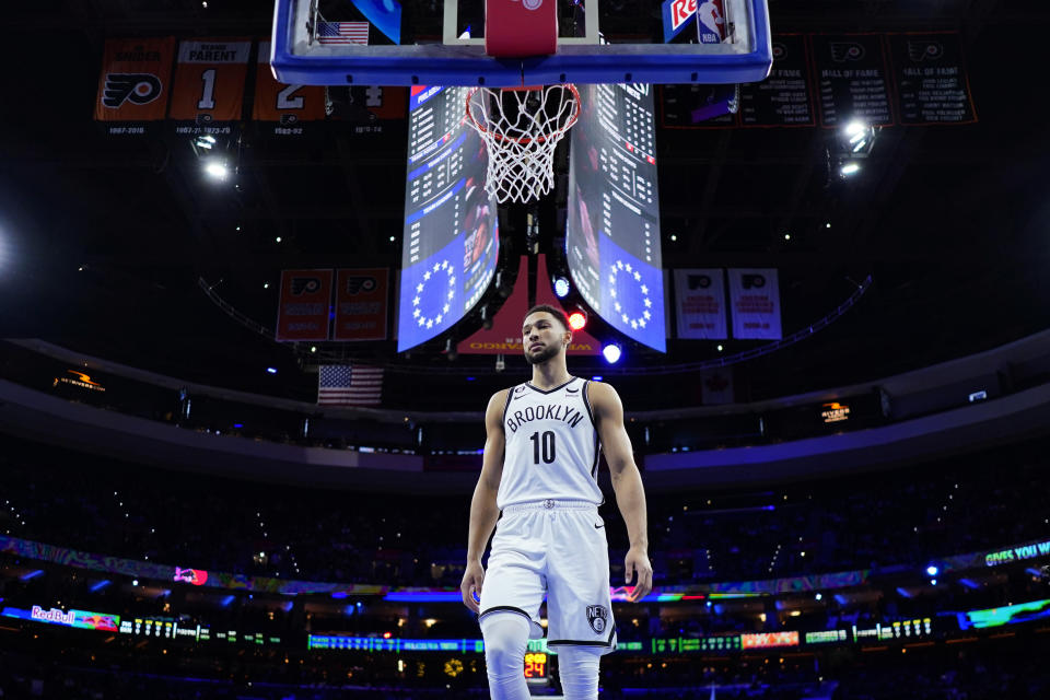 Brooklyn Nets' Ben Simmons walks the court during the first half of an NBA basketball game against the Philadelphia 76ers, Tuesday, Nov. 22, 2022, in Philadelphia. (AP Photo/Matt Slocum)