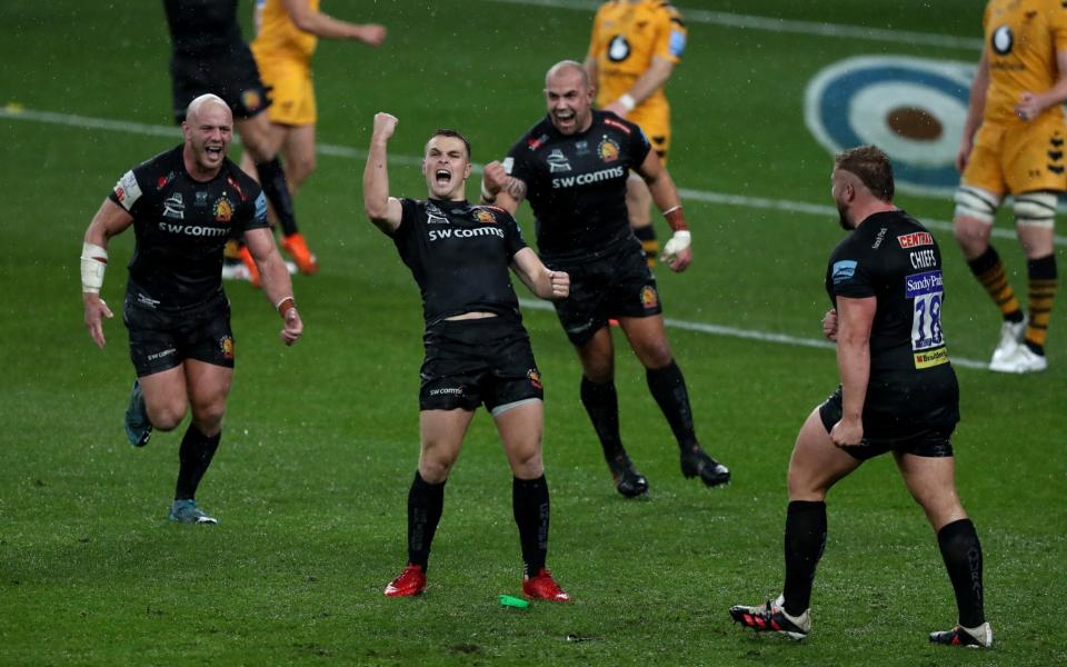 Exeter players celebrate at the full-time whistle - GETTY IMAGES