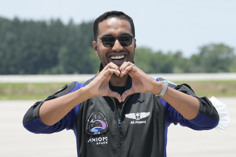 Saudi Arabian astronaut Ali al-Qarni greets family and friends as he arrives at the Kennedy Space Center in Cape Canaveral, Fla., for a scheduled launch Sunday, May 21, 2023. (AP Photo/John Raoux)