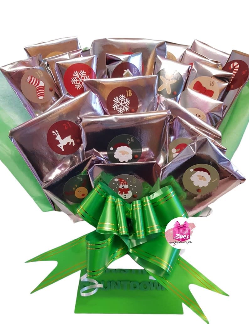 <p><a href="https://www.etsy.com/listing/879117738/advent-calendar-chocolate-bouquet-type" rel="nofollow noopener" target="_blank" data-ylk="slk:Shop Now;elm:context_link;itc:0;sec:content-canvas" class="link ">Shop Now</a></p><p>Chocolate Bouquet Advent Calendar </p><p>etsy.com</p><p>$32.48</p><span class="copyright">ZoesHandmadeGifts</span>