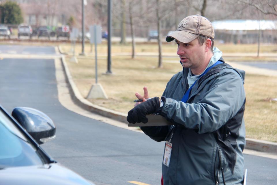 Holland Middle School principal Nick Cassidy assists with a technology distribution day in the spring of 2020. Cassidy was named the district's interim superintendent Tuesday, Nov. 30, 2021.