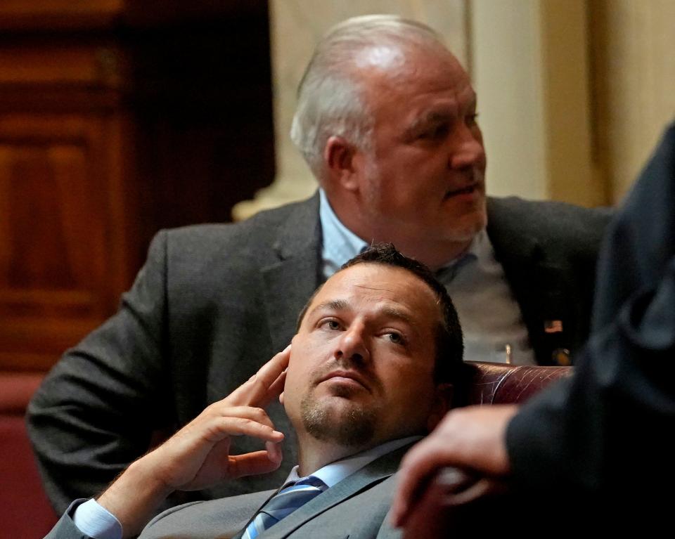 Wisconsin State Senator Romaine Quinn, republican from Cameron, district 2,  talks with other senators prior to the start of the  senate session on Wednesday, June 14, 2023, in Madison. Seated behind him is senator Cory Tomczyk, republican from Mosinee, district 29.