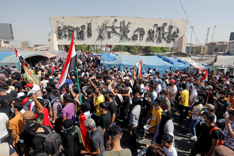 Iraqi students and activists march in Baghdad for protests anniversary, gather in Tahrir square