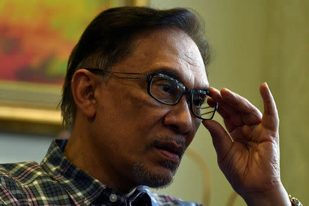 Malaysian politician Anwar Ibrahim speaks to Reuters during an interview at his house in Kuala Lumpur, Malaysia May 17, 2018. REUTERS/Stringer