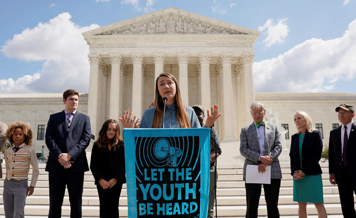 Kelsey Juliana, a lead plaintiff in the climate lawsuit against the federal government, speaks outside the Supreme Court in September. (Photo: Kevin Lamarque / Reuters)