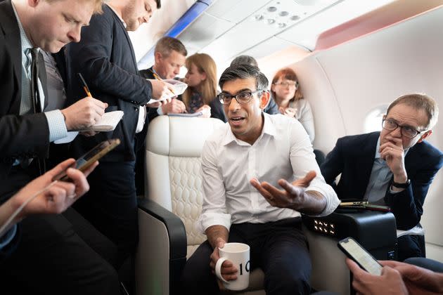 Prime minister Rishi Sunak holds a huddle with political journalists on board a government plane as he heads to Japan to attend the G7 summit in Hiroshima.