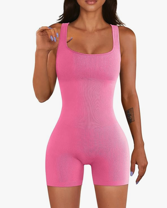 model wearing hot pink ribbed bodysuit romper