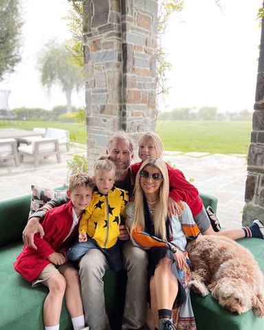 <p>Jessica Simpson/Instagram</p> Jessica Simpson posing with her husband Eric Johnson and their three kids at their L.A. home.