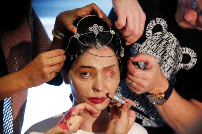 Reshma Quereshi has her makeup applied before walking to present Indian designer Archana Kochhar's Spring/Summer 2017 collections during New York Fashion Week. (Photo: Reuters)