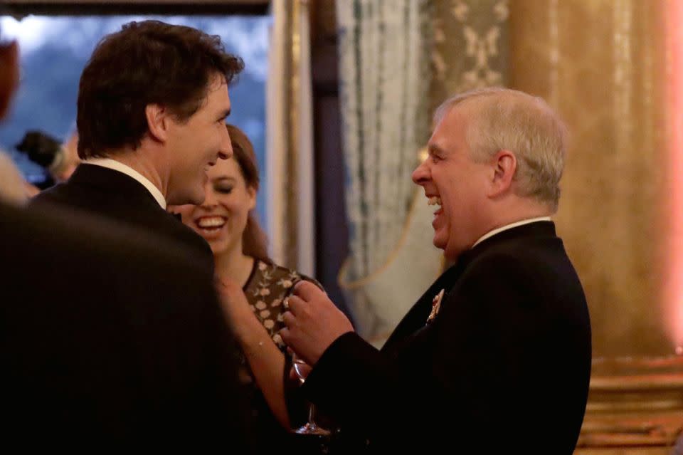 They both looked enthralled by what Justin was saying. Photo: Getty Images