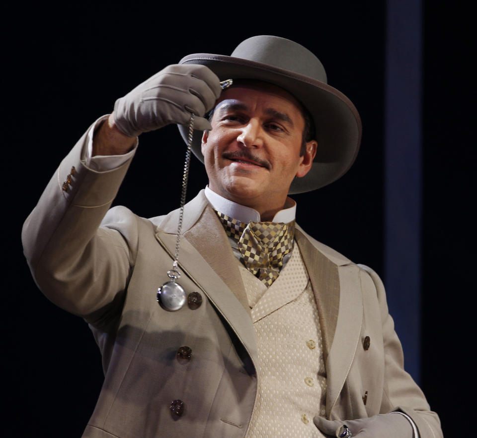 In this photo taken Feb. 9, 2012, Nathan Gunn portraying Gaylord Ravenal, performs at a dress rehearsal during the first act of the Lyric Opera of Chicago's production of "Show Boat." (AP Photo/M. Spencer Green)