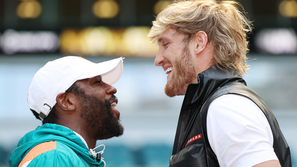 Floyd Mayweather and Logan Paul face off prior to their June 6 match at Hard Rock Stadium in Miami Gardens, Florida. (Photo by Cliff Hawkins/Getty Images)