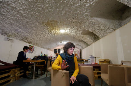 Anna Orosz, a leading member of political movement Momentum which challenges Budapest's 2024 Olympic bid with a referendum, speaks during an interview with Reuters at Momentum's headquarters, located in a basement in Budapest, Hungary, February 20, 2017. REUTERS/Laszlo Balogh