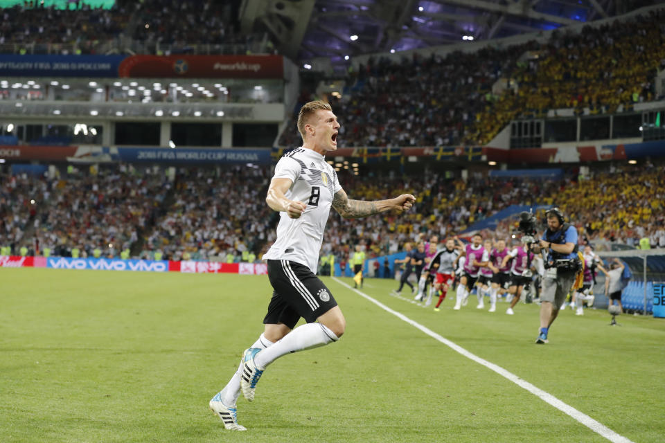 Germany’s Toni Kroos celebrates after he scoring the winner from just inside the penalty box