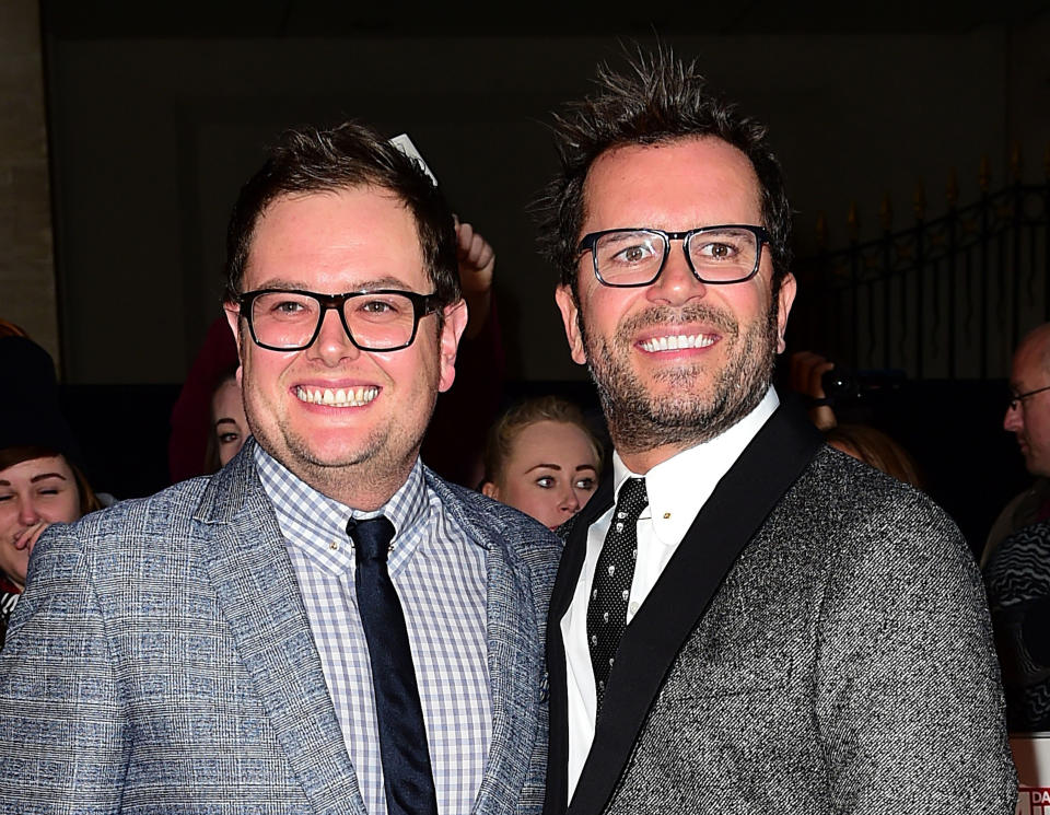 Alan Carr and husband Paul Drayton. (PA)