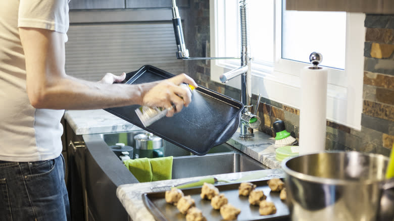 Spraying baking sheet for cookies