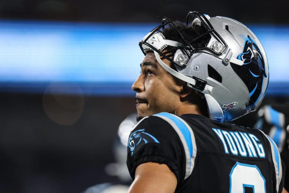 Carolina Panthers quarterback Bryce Young looks up from the sidelines against the Indianapolis Colts at the Bank of America Stadium in Charlotte, N.C., on Sunday, November 5, 2023.