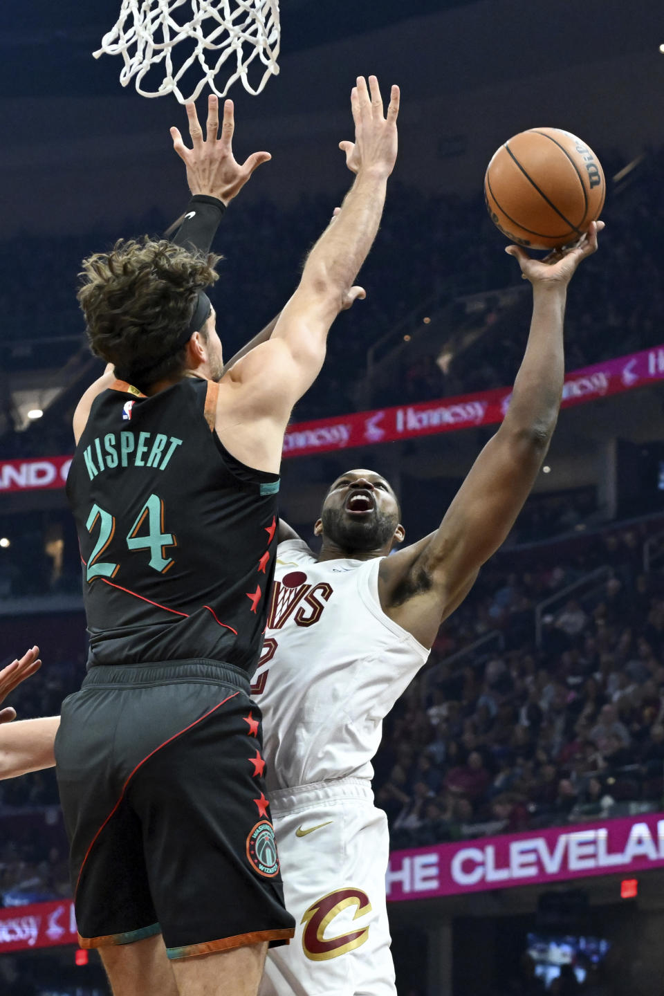 Cleveland Cavaliers' Tristan Thompson shoots against Washington Wizards' Corey Kispert (24) during the first half of an NBA basketball game Friday, Jan. 5, 2024, in Cleveland. (AP Photo/Nick Cammett)