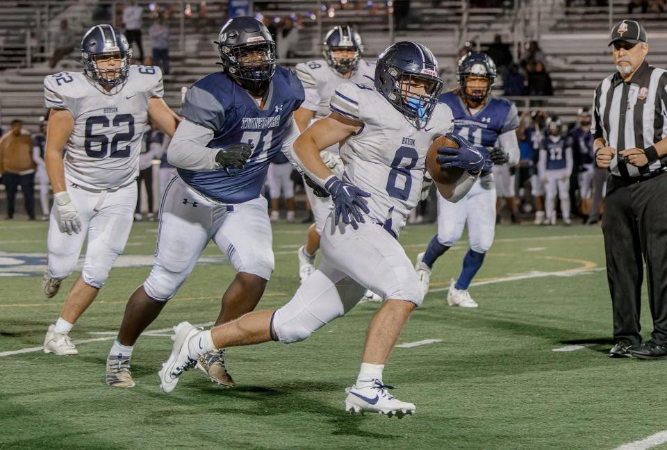 Hudson running back Ian Ludewig breaks loose late during Hudson's game Thursday at Twinsburg.