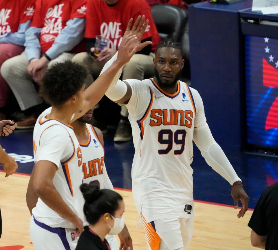 Apr 22, 2022; New Orleans, Louisiana, U.S.;  Phoenix Suns forwards Cameron Johnson (23) and Jae Crowder (99) celebrate after winning Game 3 of the Western Conference playoffs against the New Orleans Pelicans 114-111.