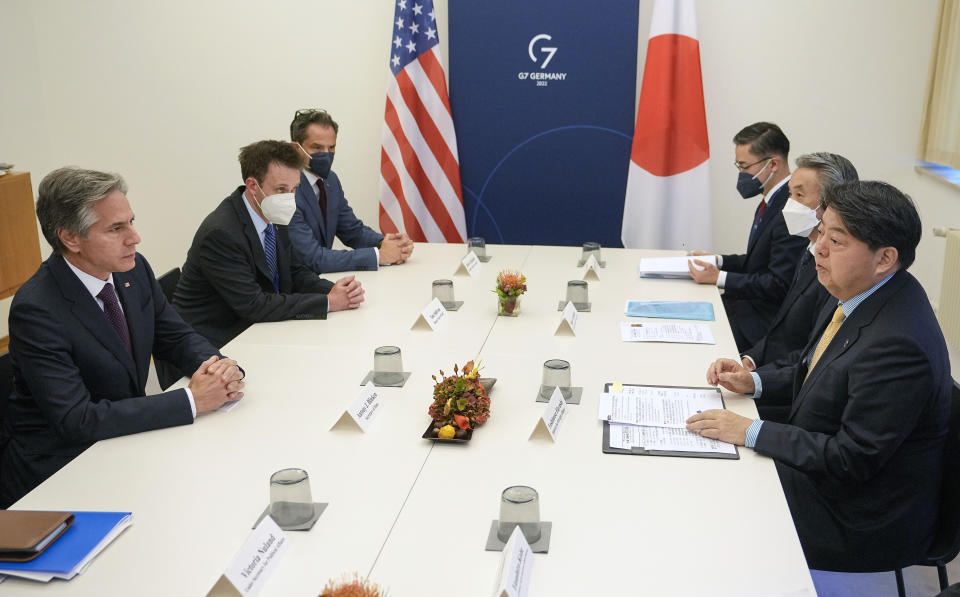 United States secretary of state Antony Blinken and Foreign Minister Yoshimasa Hayashi of Japan, right, meet for bilateral talks at the G7 Foreign Ministers' Meeting in Muenster, Germany, Friday, Nov. 4, 2022. (AP Photo/Martin Meissner, Pool)