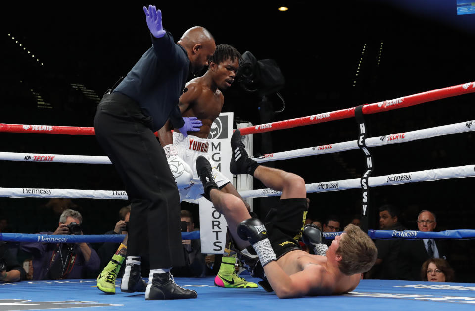 LAS VEGAS, NEVADA - NOVEMBER 02:  Referee Robert Hoyle calls off the super welterweight fight between Evan Holyfield (C) and Nick Winstead at MGM Grand Garden Arena on November 2, 2019 in Las Vegas, Nevada. Holyfield won by first-round TKO.  (Photo by Steve Marcus/Getty Images)