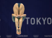Anabelle Smith of Australia competes in women's diving 3m springboard preliminary at the Tokyo Aquatics Centre at the 2020 Summer Olympics, Friday, July 30, 2021, in Tokyo, Japan. (AP Photo/Dmitri Lovetsky)