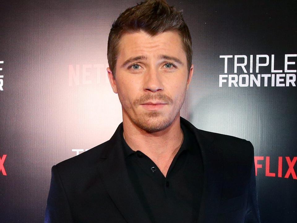 Garrett Hedlund at a red carpet event for "Triple Frontier" in Singapore in March 2019.