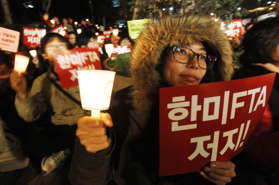 South Korean protesters rally against a Free Trade Agreement (FTA)