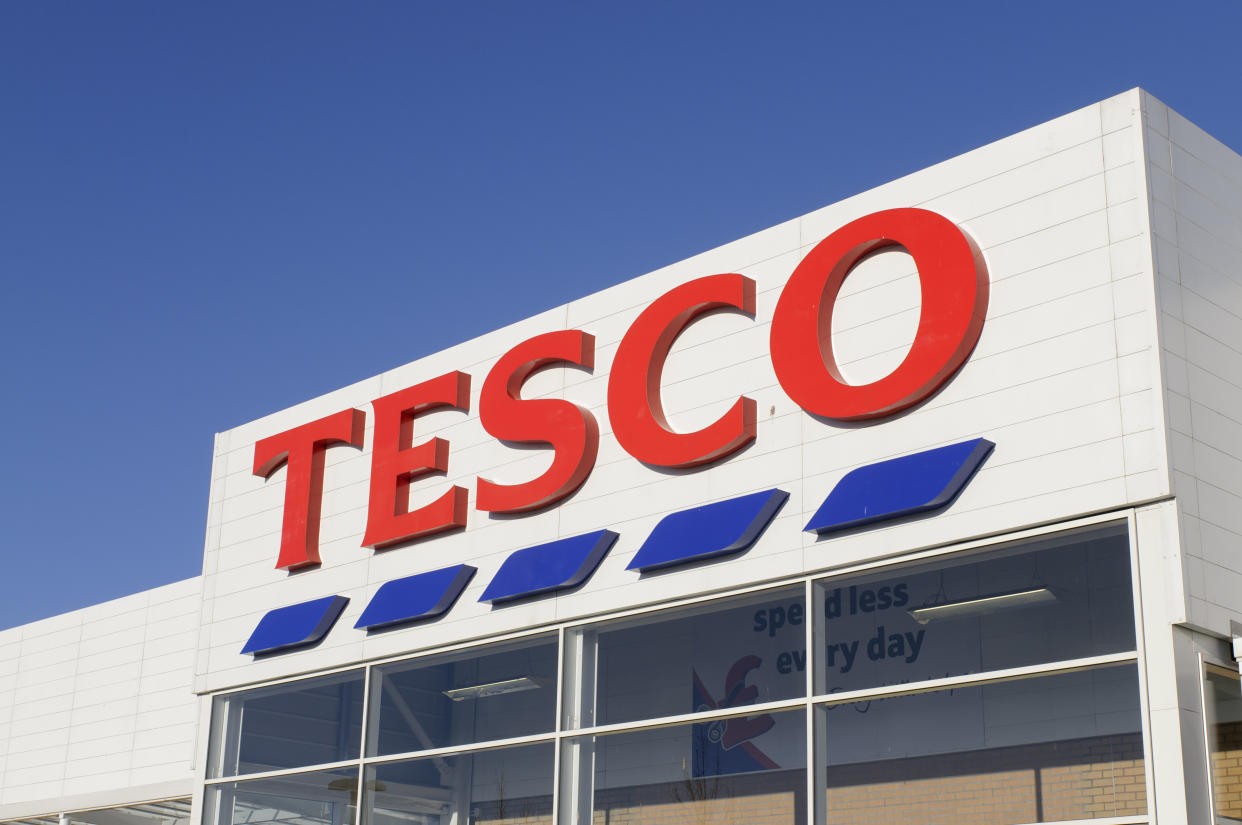 Edinburgh, Scotland, UK - 21st March 2011: Front entrance sign of a Tesco Superstore supermarket at the Hermiston Gait Retail Park in Edinburgh. Tesco divide their UK stores into six categories, with superstores such as this one being classed as a large supermarket.