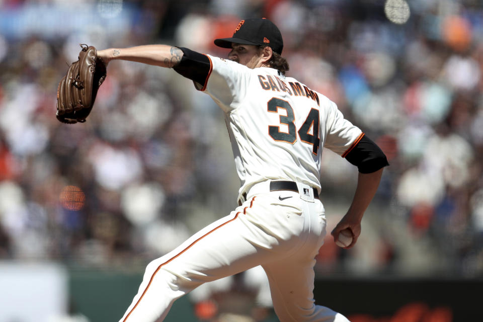 San Francisco Giants' Kevin Gausman throws against the St. Louis Cardinals during the first inning of a baseball game in San Francisco, Monday, July 5, 2021. (AP Photo/Jed Jacobsohn)