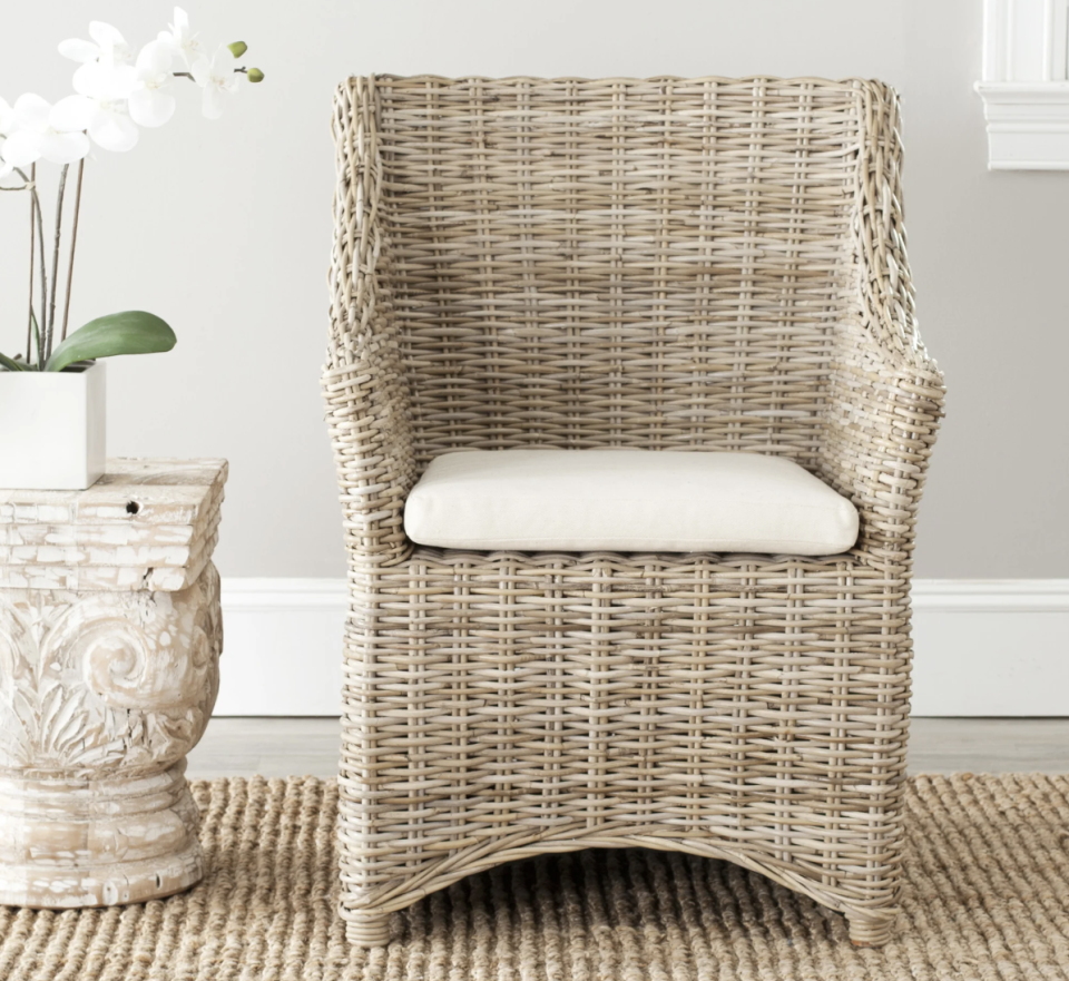 Safavieh Dining Rural Woven St Thomas Wicker Washed-out Brown Wing Back Arm Chair. (Photo: Overstock)