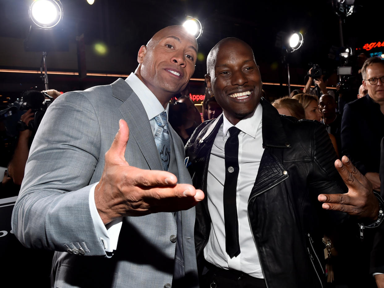 The Rock and Tyrese Gibson look chummy at the <i>Furious 7</i> premiere at TCL Chinese Theatre in Hollywood on April 1, 2015. (Photo: Getty Images)