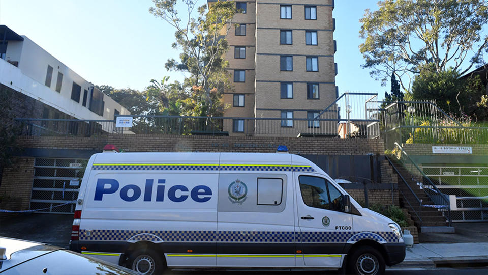 A NSW Police car outside the Bondi Junction apartment building as residents serve out 14 days in isolation.