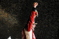 HOMESTEAD, FL - NOVEMBER 20: Tony Stewart, driver of the #14 Office Depot/Mobil 1 Chevrolet, celebrates in Victory Lane after winning the NASCAR Sprint Cup Series Ford 400 and the 2011 Series Championship at Homestead-Miami Speedway on November 20, 2011 in Homestead, Florida. Stewart wins his third NASCAR Championship. (Photo by Jared C. Tilton/Getty Images)