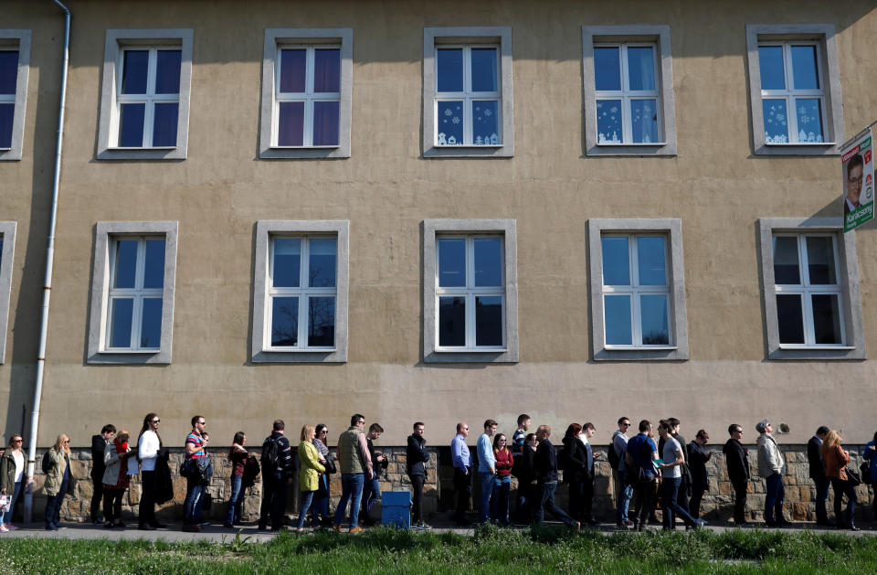 People wait in line to vote during Hungarian parliamentary elections at a polling station in Budapest, Hungary, on April 8, 2018. (Photo: Bernadett Szabo / Reuters)