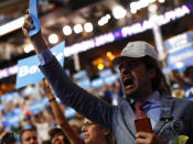 <p>A supporter of former Democratic U.S. presidential candidate Senator Bernie Sanders cheers as Sanders speaks during the first session at the Democratic National Convention in Philadelphia, Pennsylvania, July 25, 2016. (REUTERS/Carlos Barria)</p>